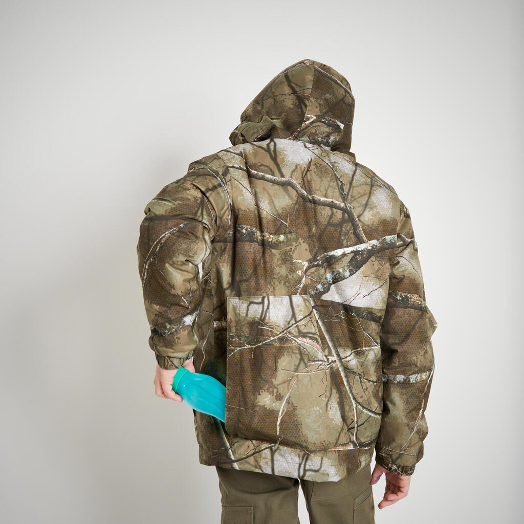 Detská hrejivá poľovnícka bunda Woodland 100 maskáčová