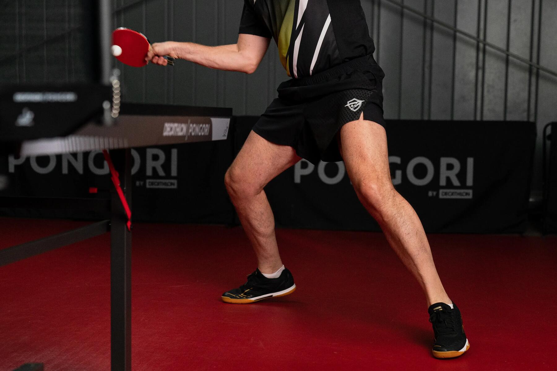 Woman serving at table tennis
