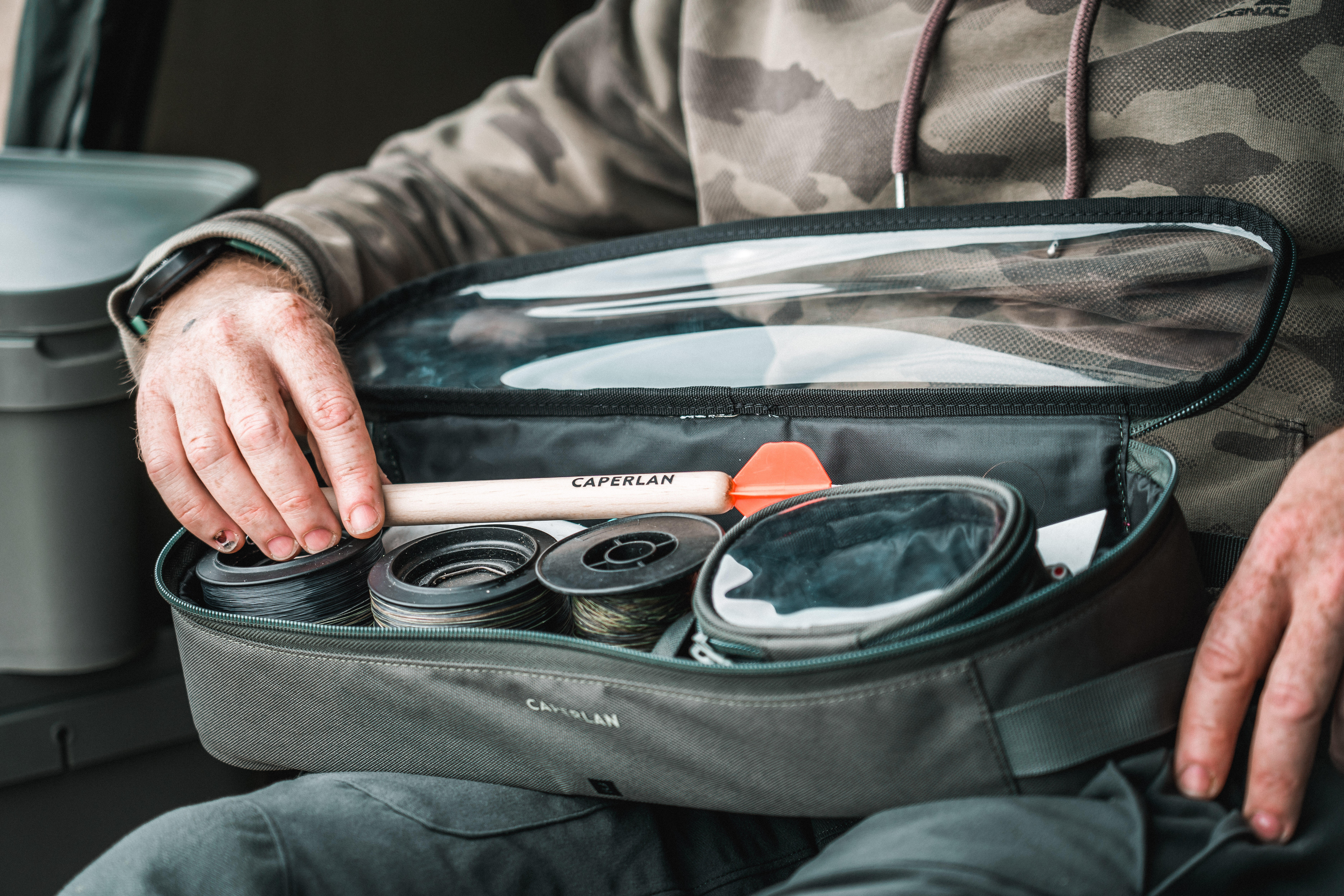Fishing bag organised with tackle and fishing accessories