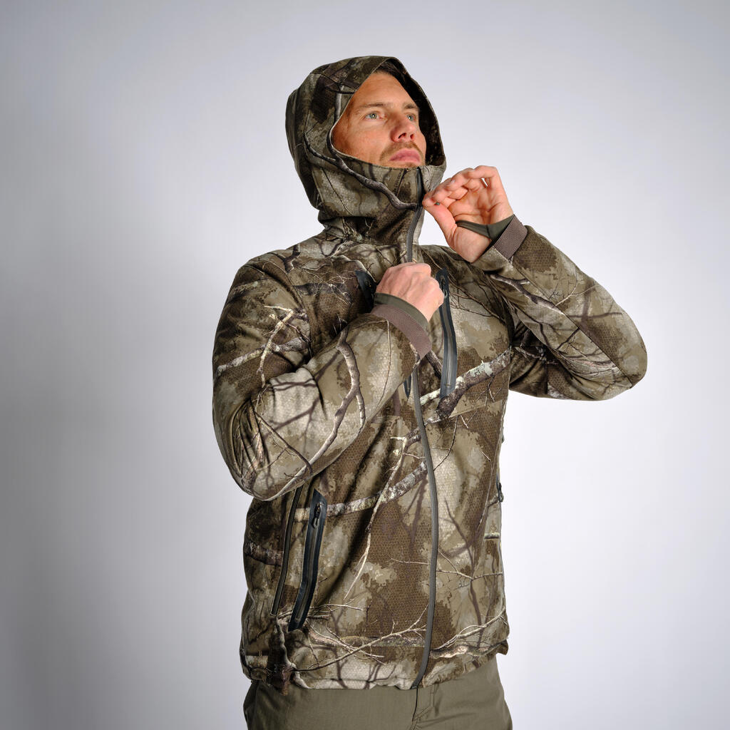 Klusa, silta, ūdensnecaurlaidīga medību jaka “Treemetic 900”, kamuflāžas