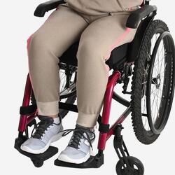 Pantalon pour personne en fauteuil roulant sale