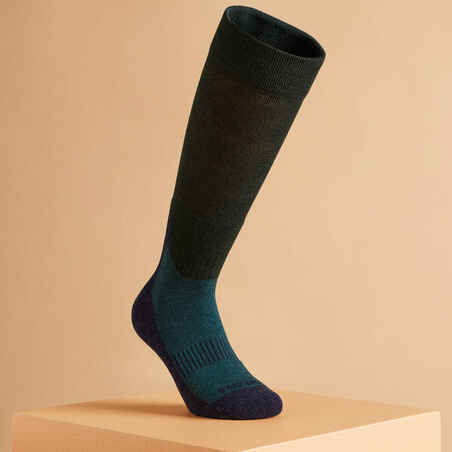 Jahalne nogavice za odrasle 500 Warm - modro/zelene          