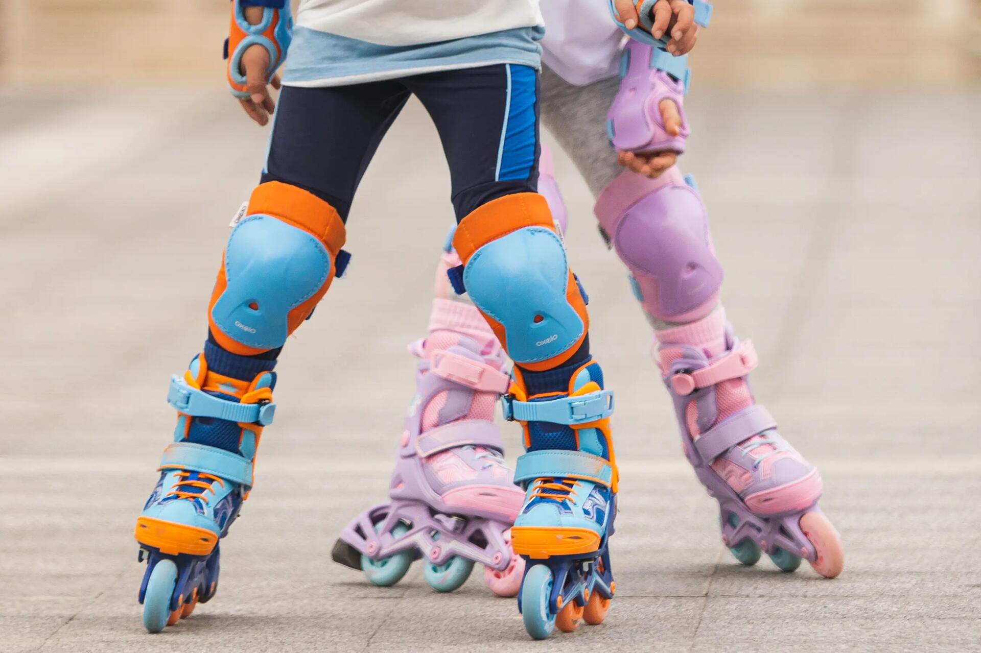 Two kids on roller skates 