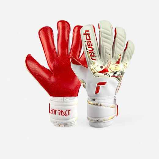 
      Damen/Herren Fussball Torwarthandschuhe - Reusch Attrakt Gold X Glueprint weiss
  