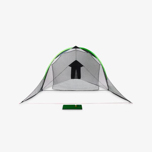 Large black and fluoro green golf practice net staked on grass