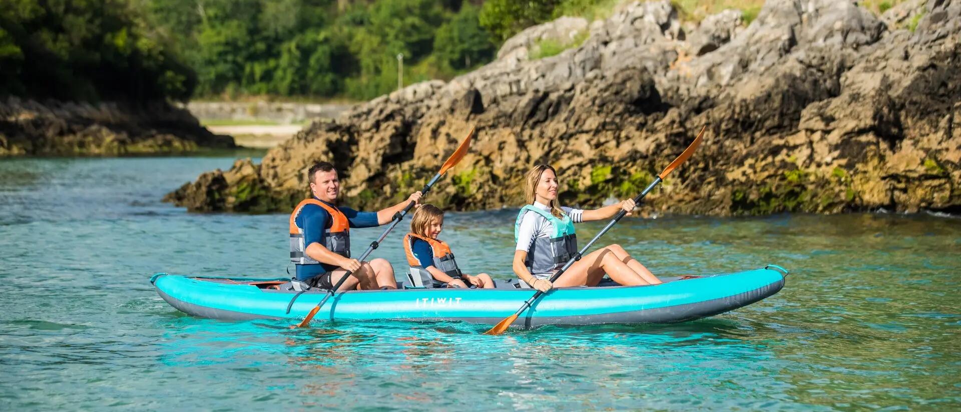 3 people kayaking 