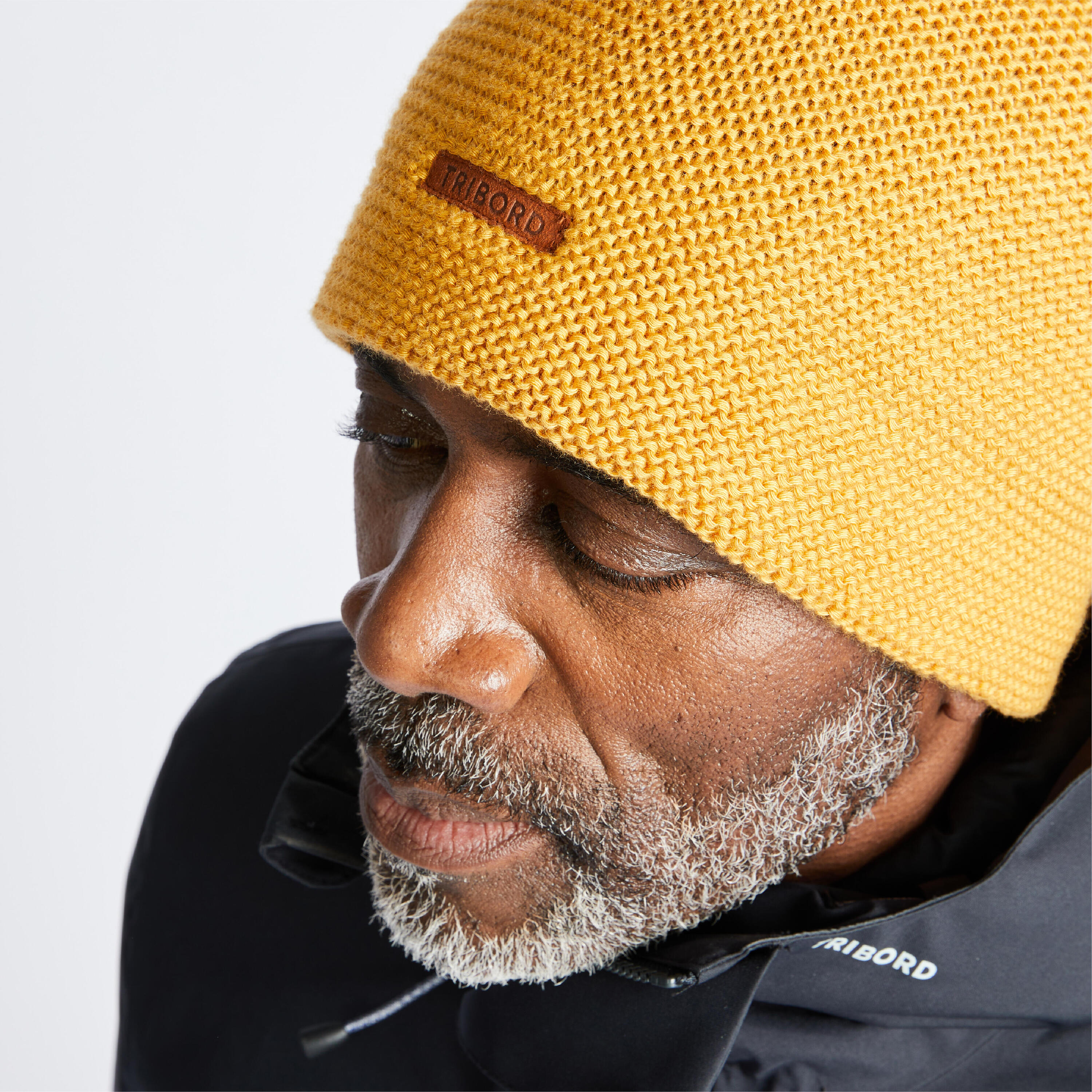 Gorro cortaviento con forro polar adulto 100 ocre 3/8