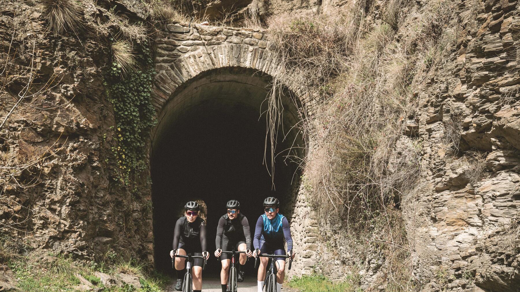 woman on her touring bike talking with another cyclist