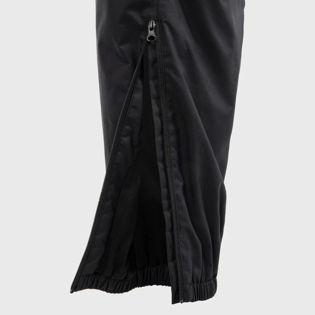 Crne vodootporne pantalone za ragbi R500