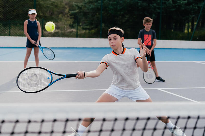 Short de tenis para niño Niños practicando tenis