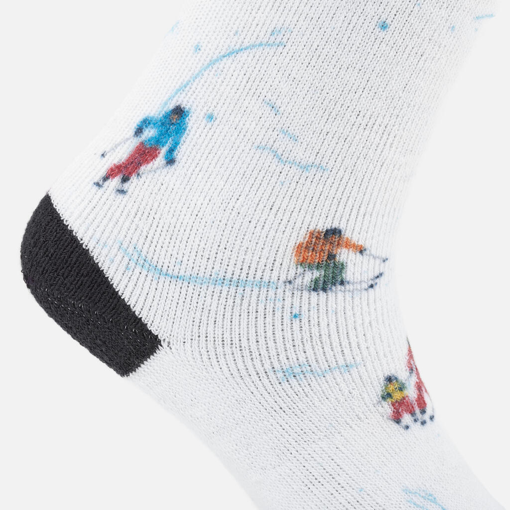 Detské lyžiarske ponožky 100 s motívom lyžiarov