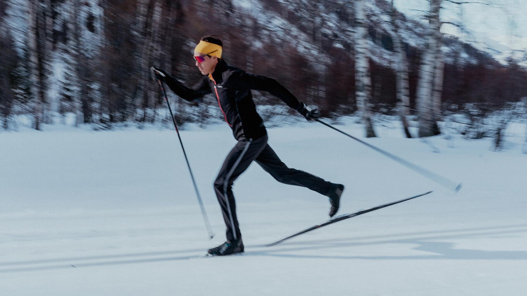 woman and man cross-country skiing