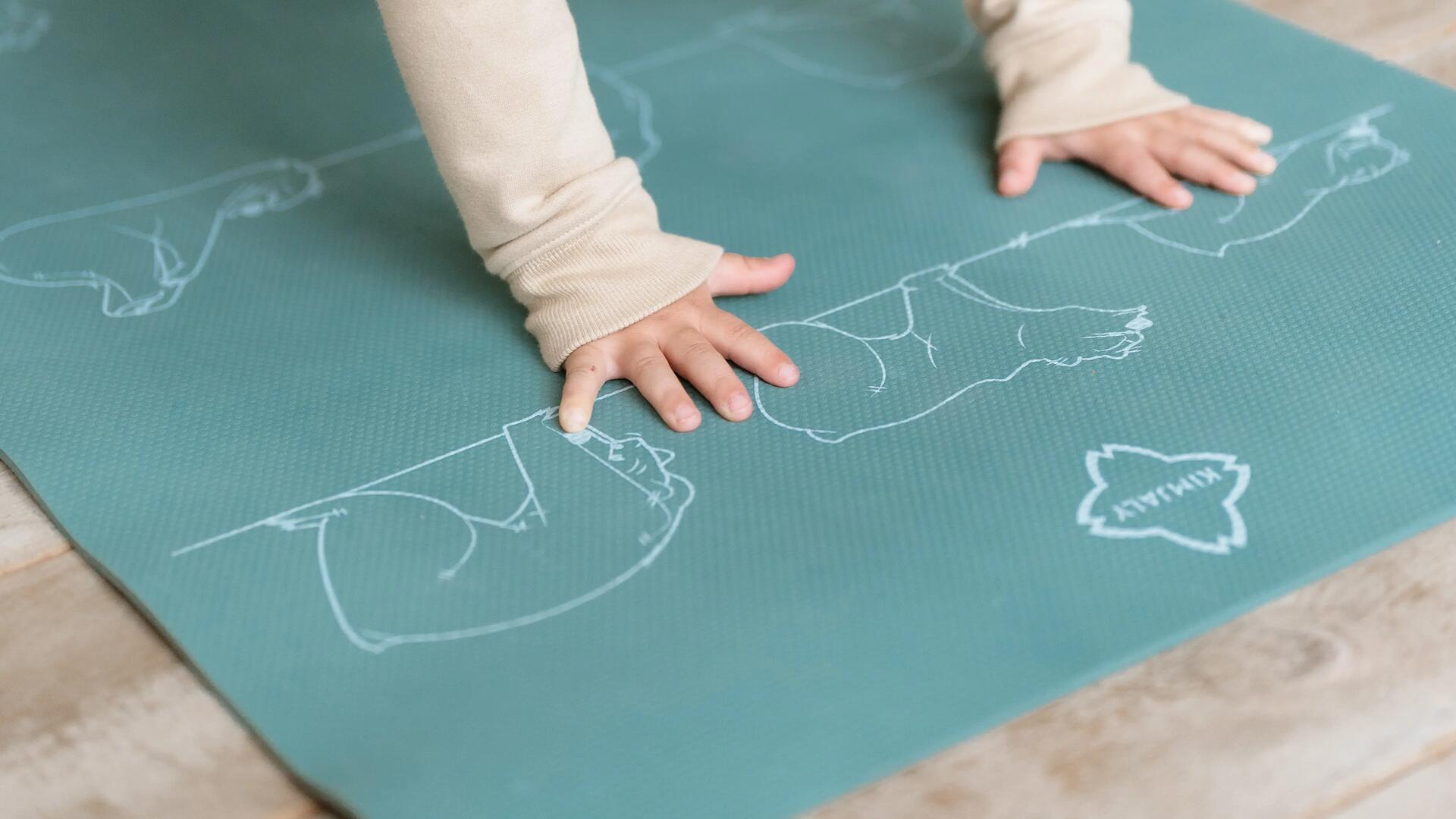 Kid doing yoga