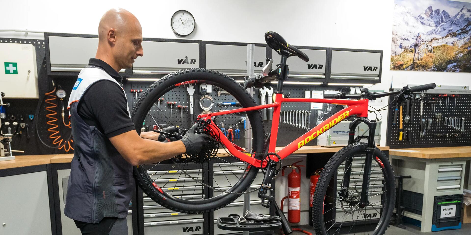 Bicicletă MTB ROCKRIDER ST 540 S ALBASTRU-PORTOCALIU: Manual de instrucțiuni, reparații