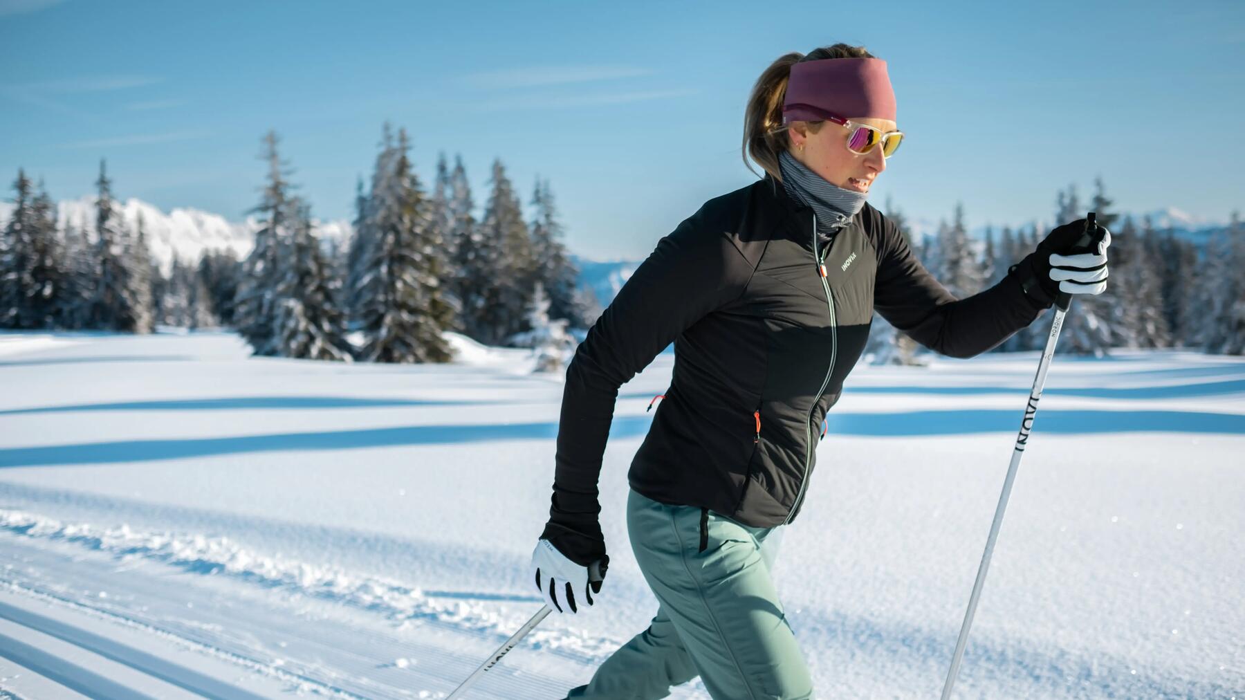 Two people cross-country skiing