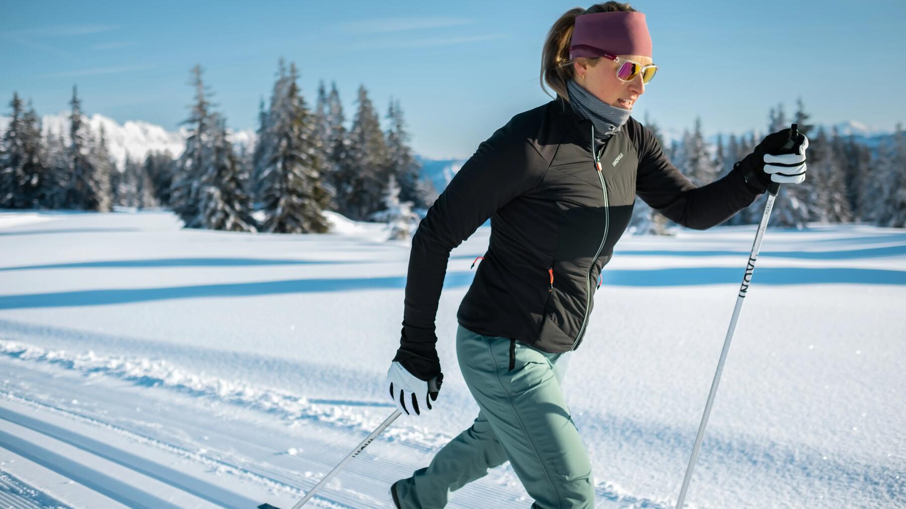 Two people cross-country skiing