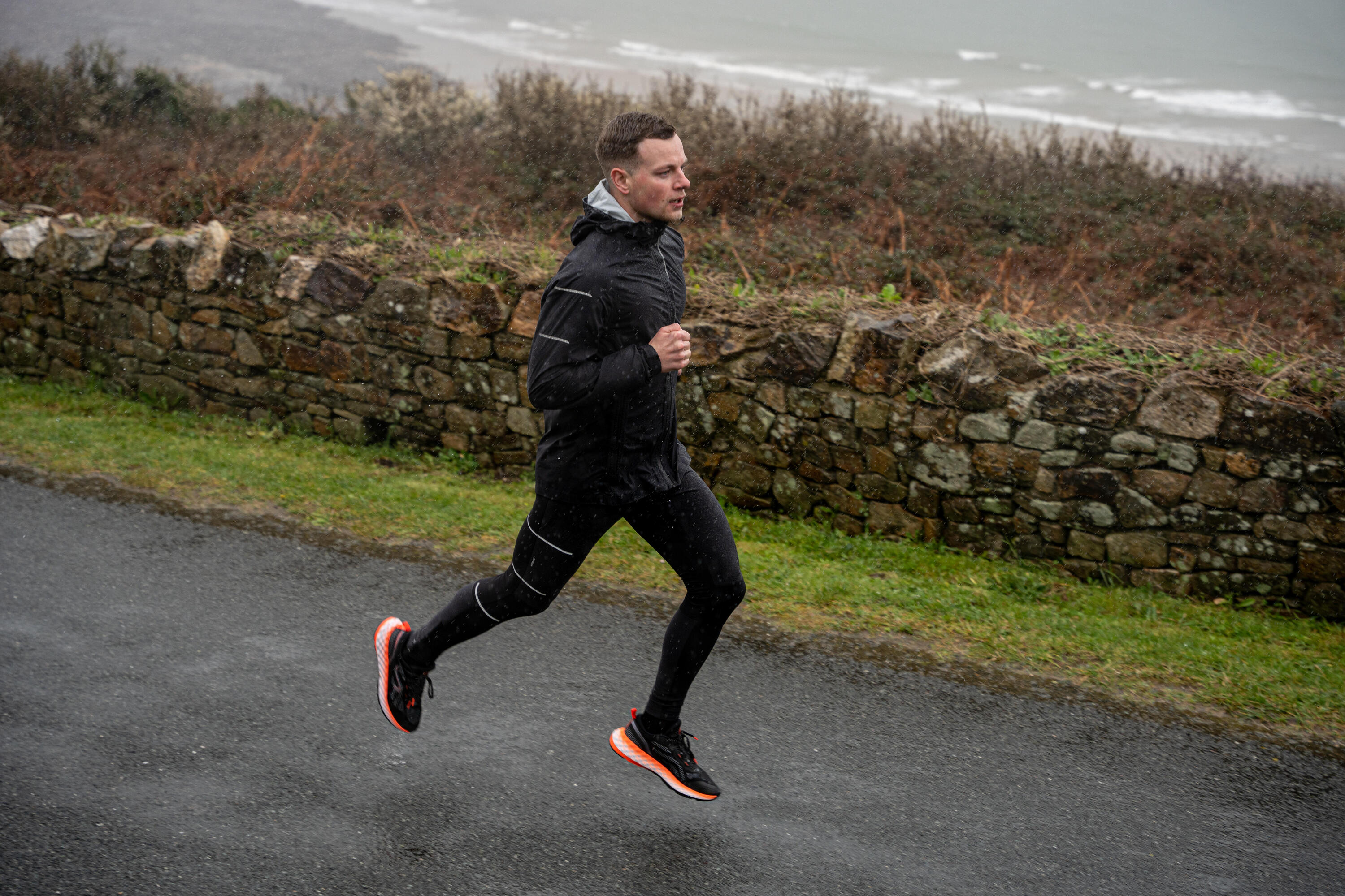 Leggings idrorepellenti running uomo RUN WARM & RAIN neri 14/17