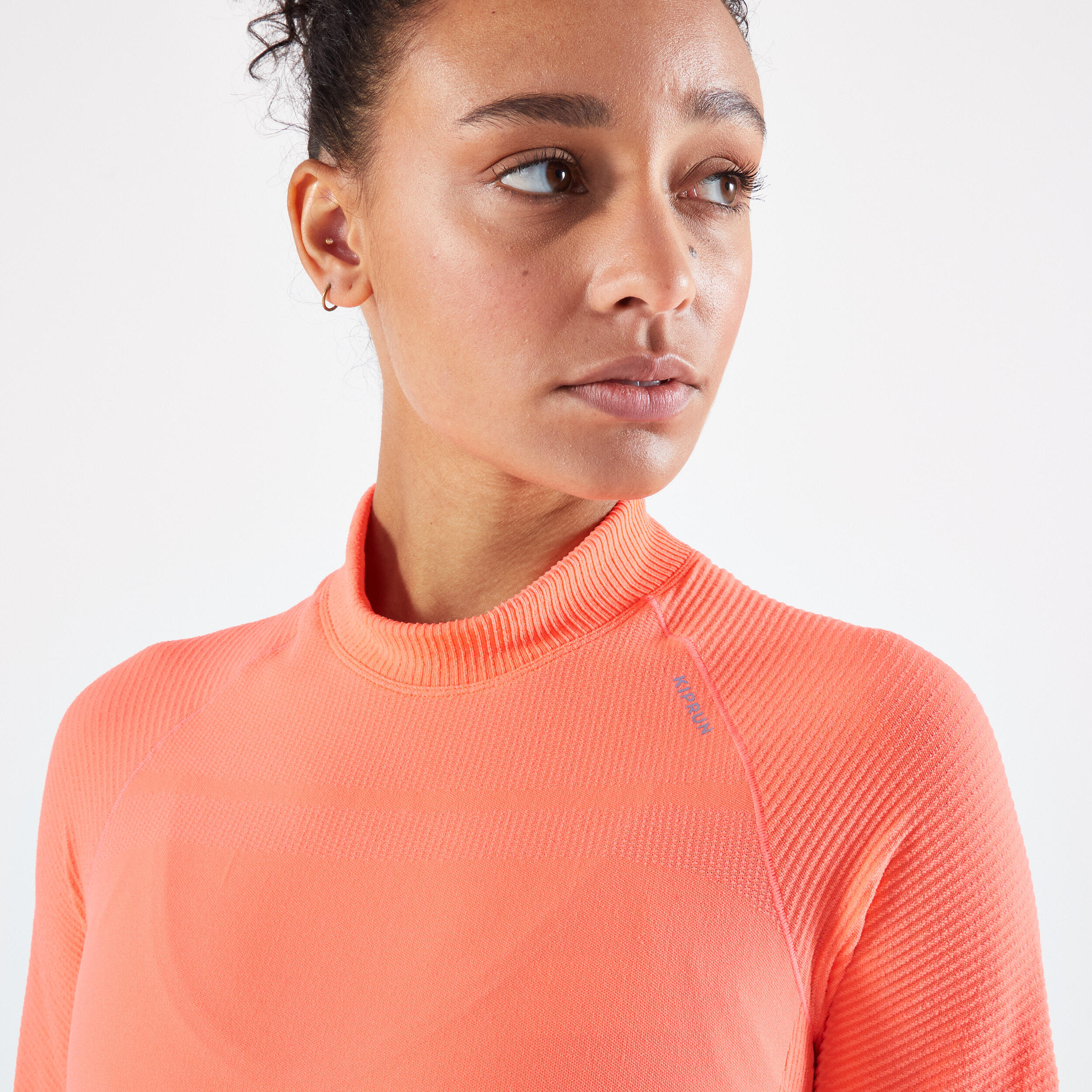 WOMEN'S KIPRUN SKINCARE SEAMLESS LONG-SLEEVED RUNNING T-SHIRT - CORAL 5/7