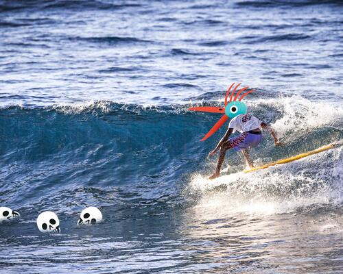 Chico surfeando con tabla Olaian