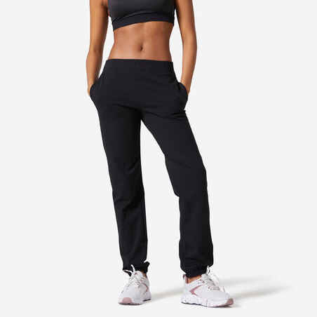 Črne ženske hlače za telovadbo 100