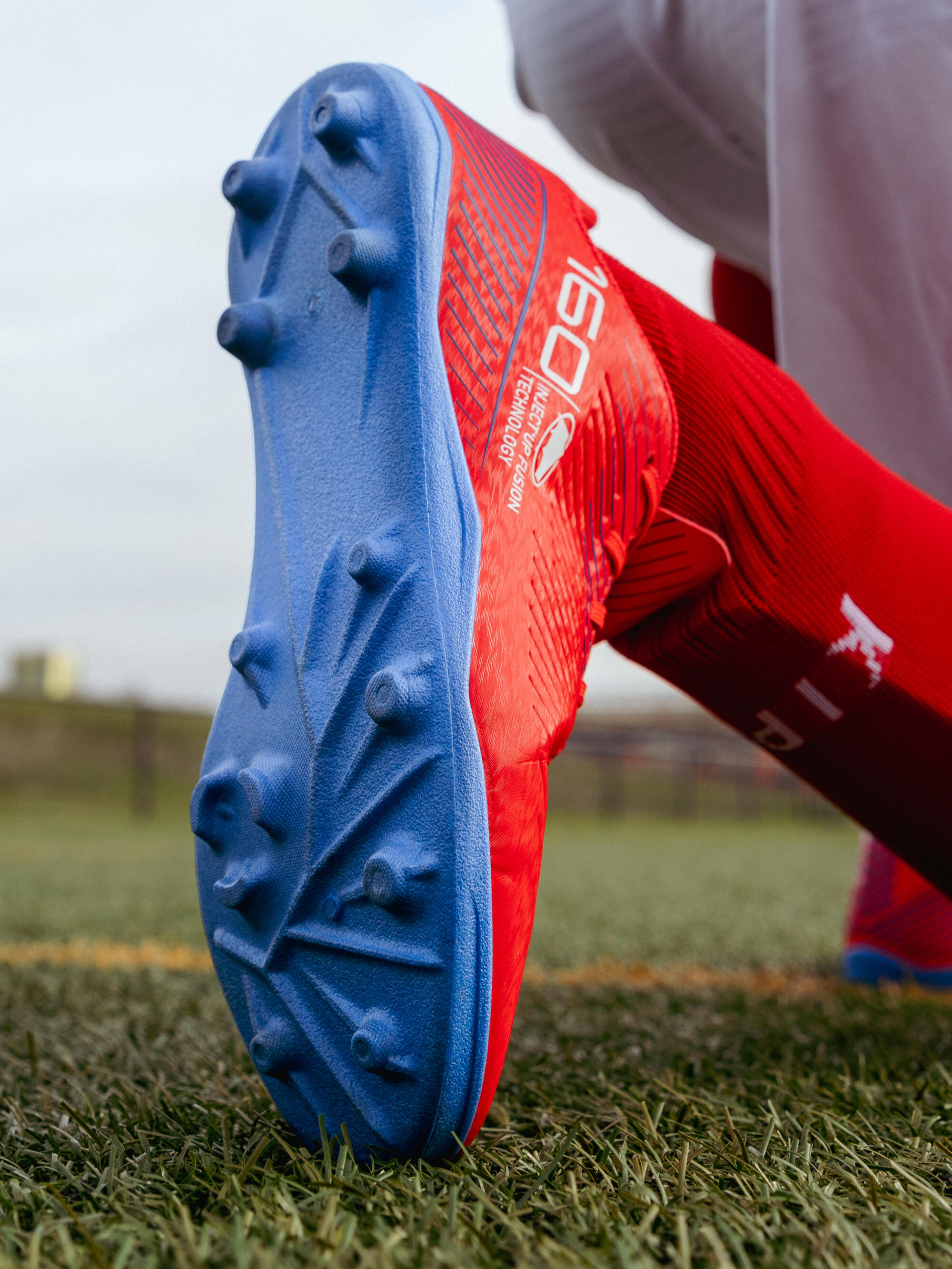 Tenis de fútbol con cintas AG/FG rojos para niños 160 JR 11/11