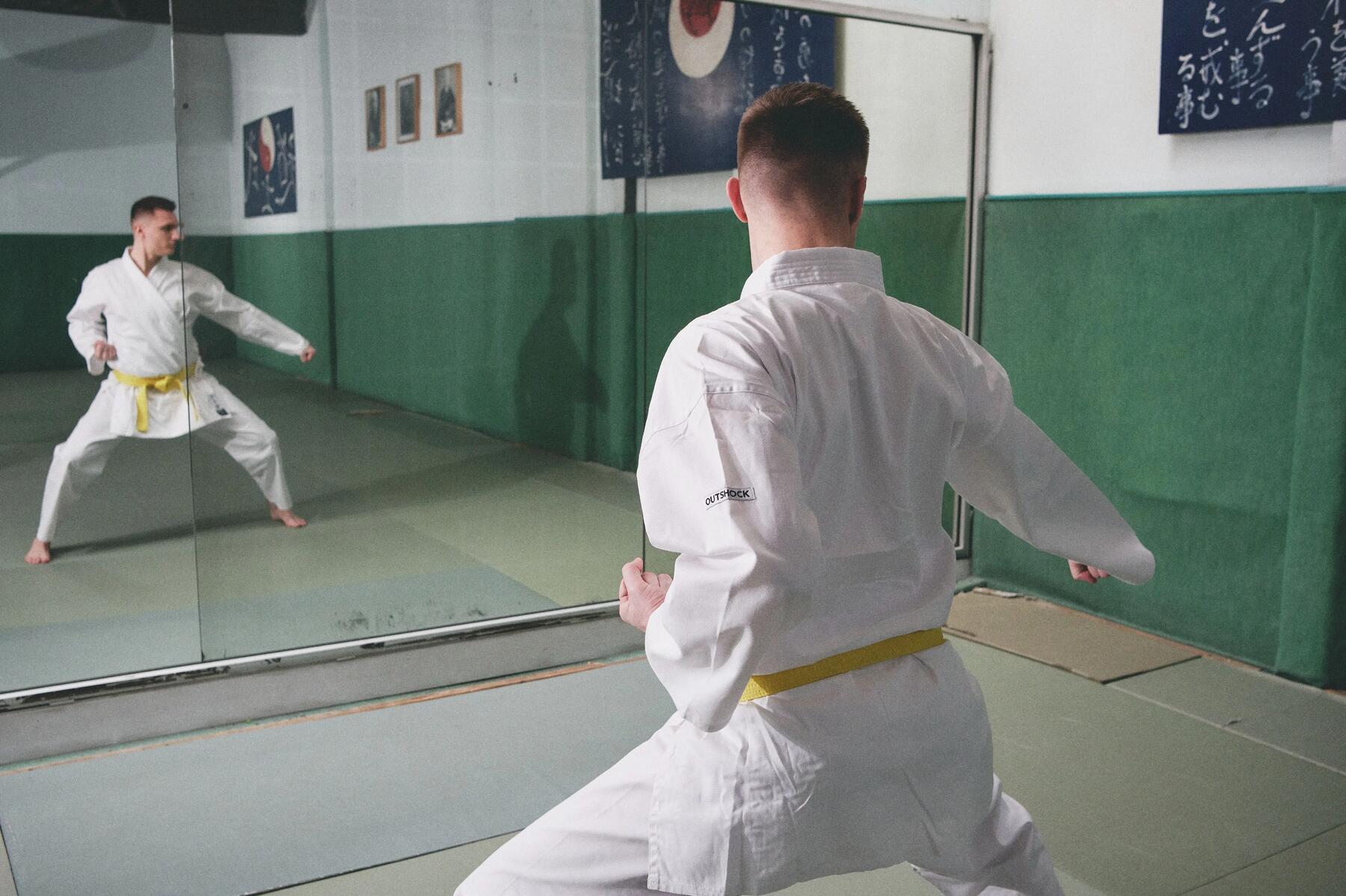 two young boys doing karate