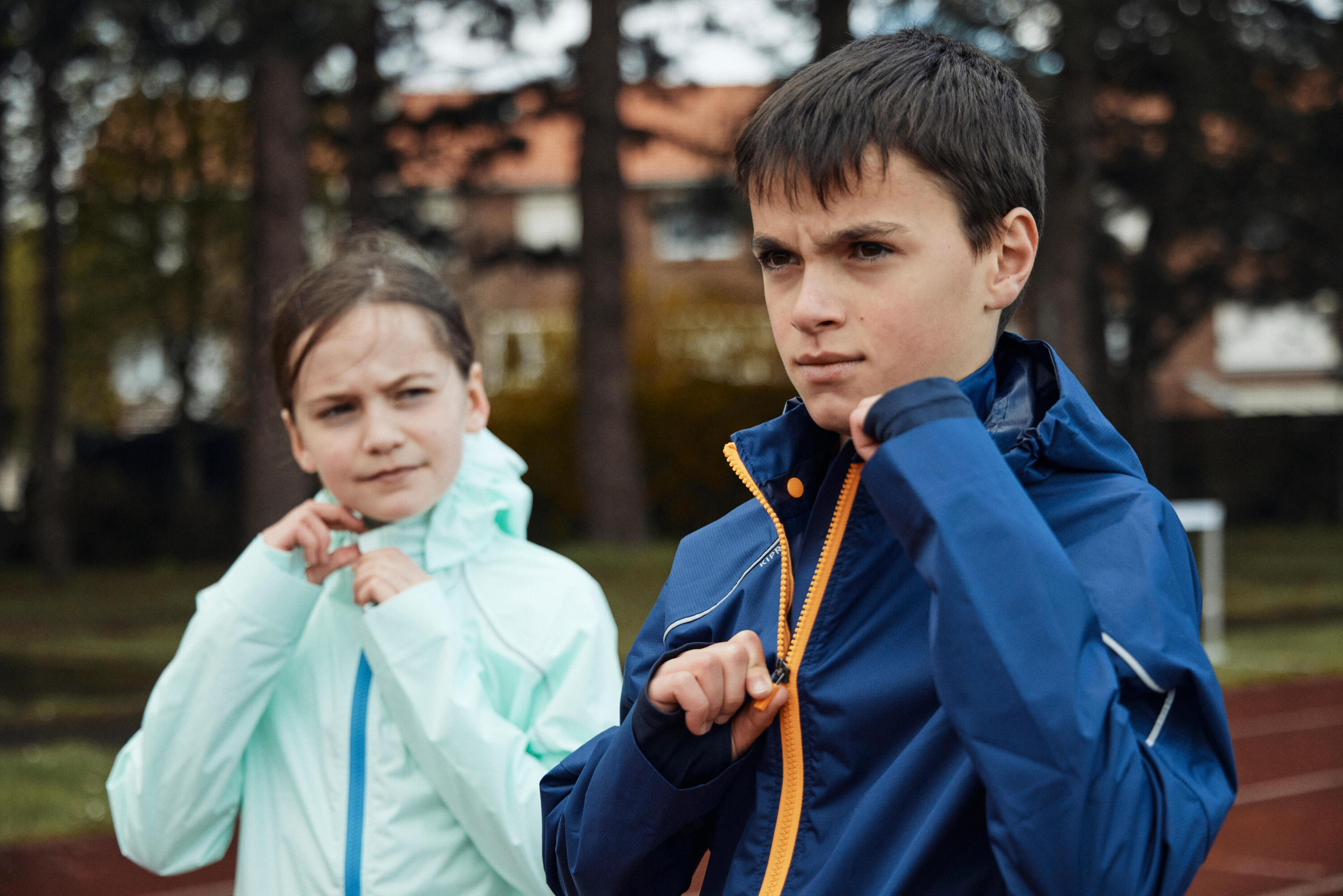 KIPRUN RAIN kid's waterproof running jacket - Blue/Orange 19/21