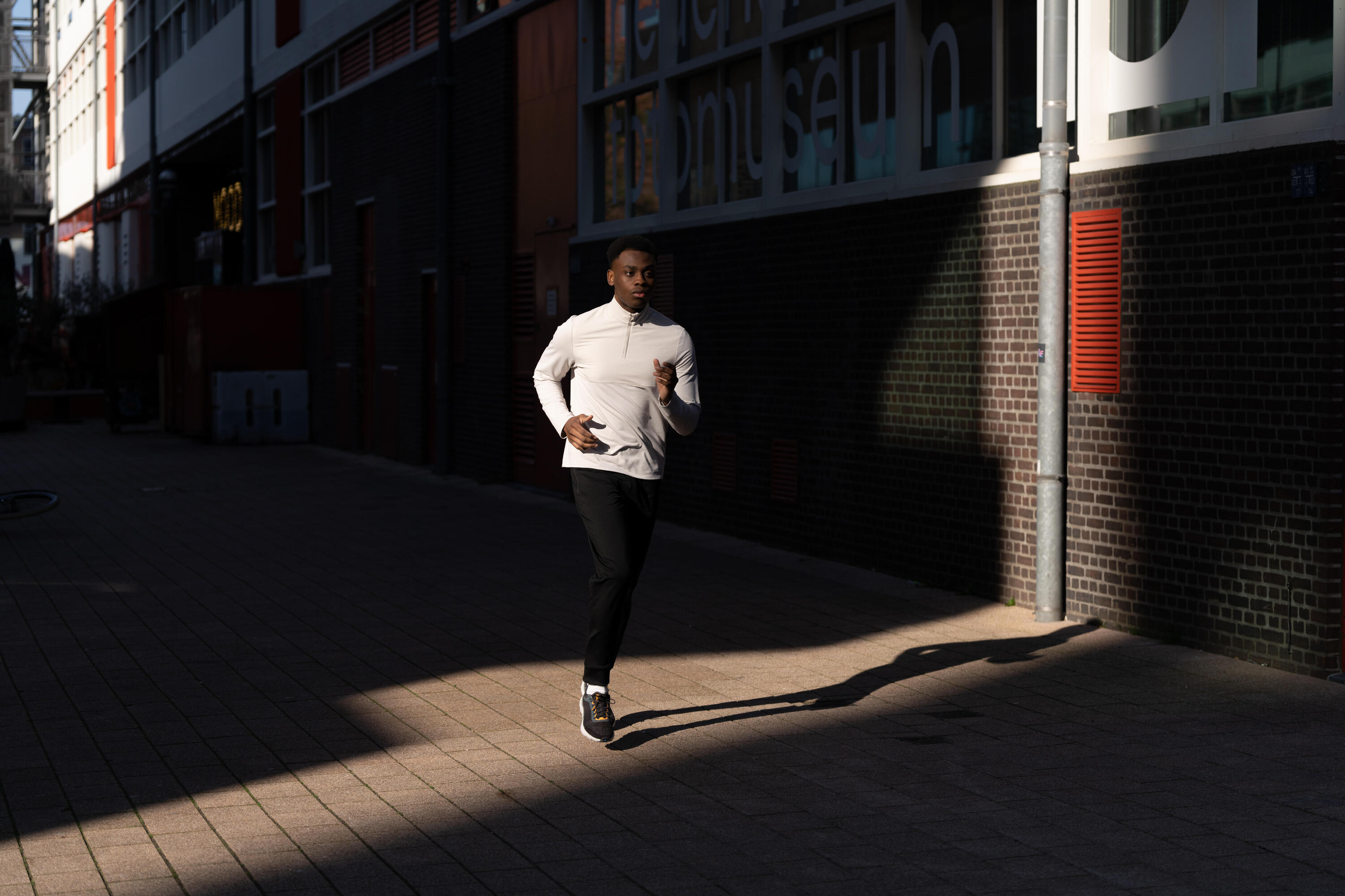 Pantalon de course à pied chaud homme, Run 100 9/10