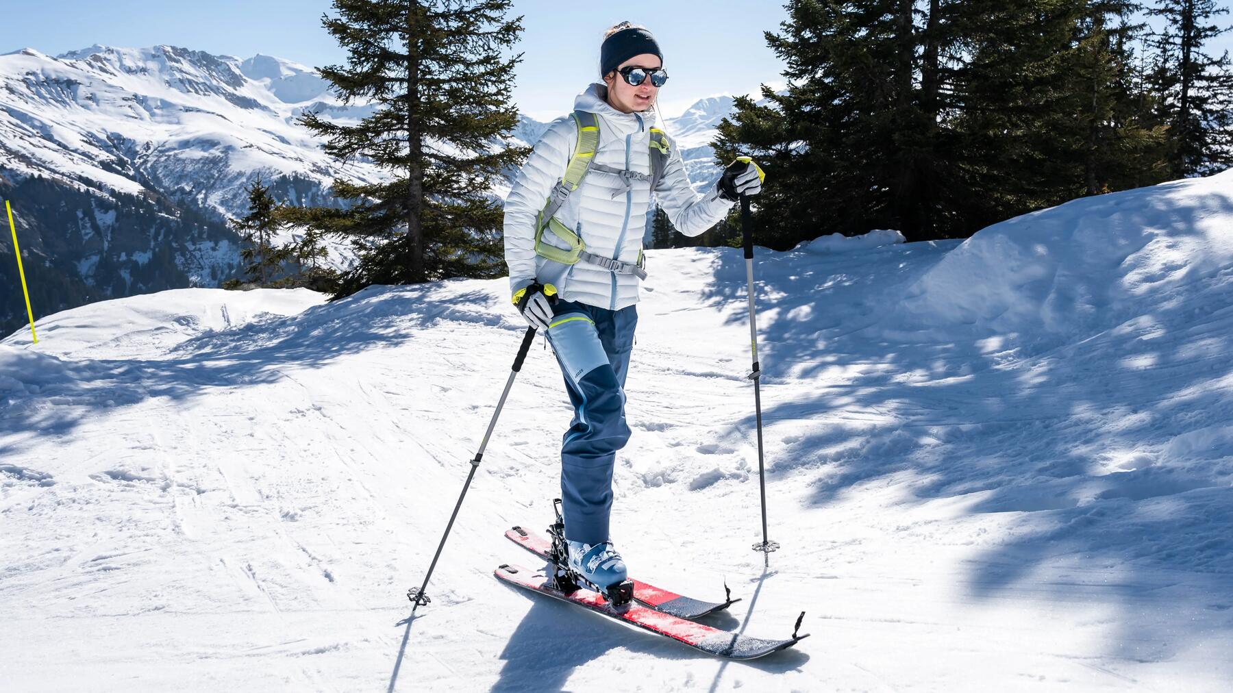 woman zipping up her ski jacket
