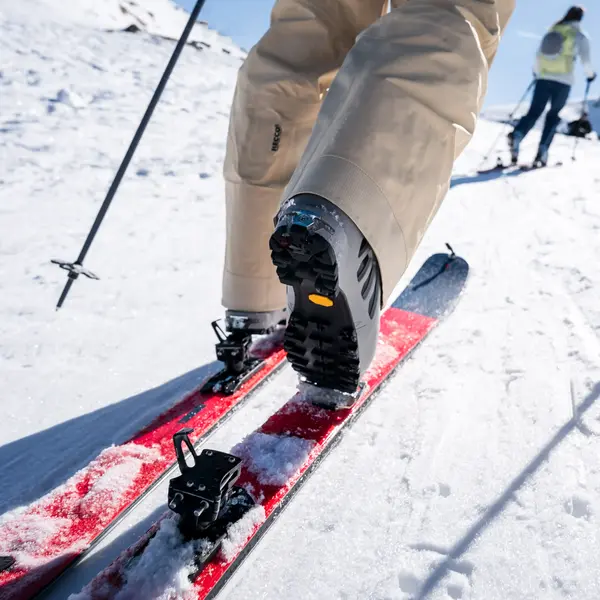 Image of 3 persons using stand-up paddles