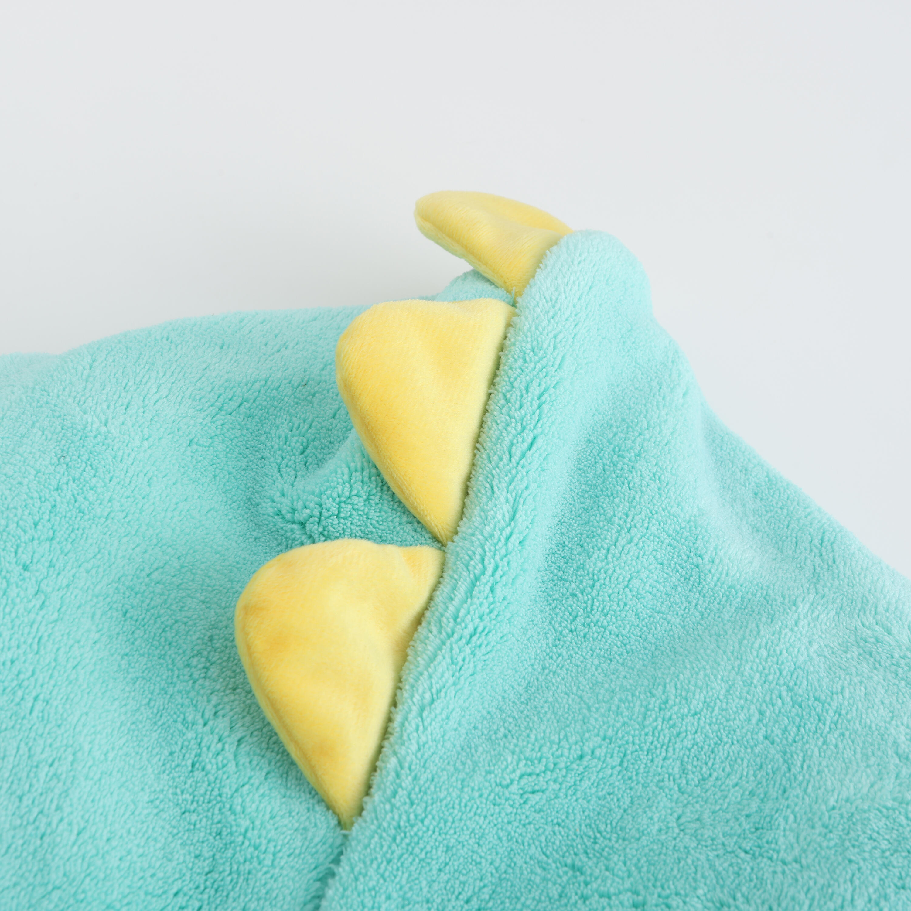 CORAL FLEECE PONCHO 500JR DINO TURQ