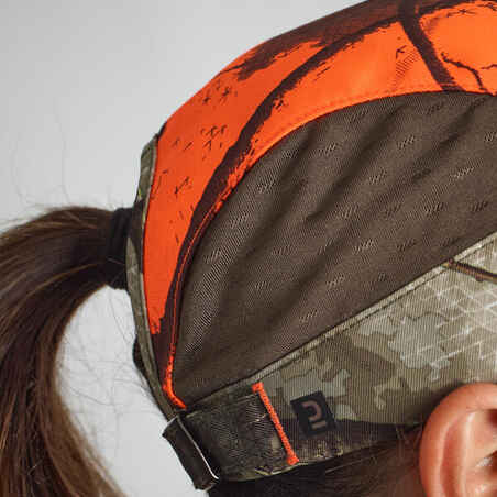 Moteriška lengva medžioklinė orui laidi kepuraitė „500“, oranžinis kamufliažas
