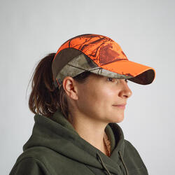 Lichte ademende jachtpet voor dames 500 camouflage Treemetic oranje