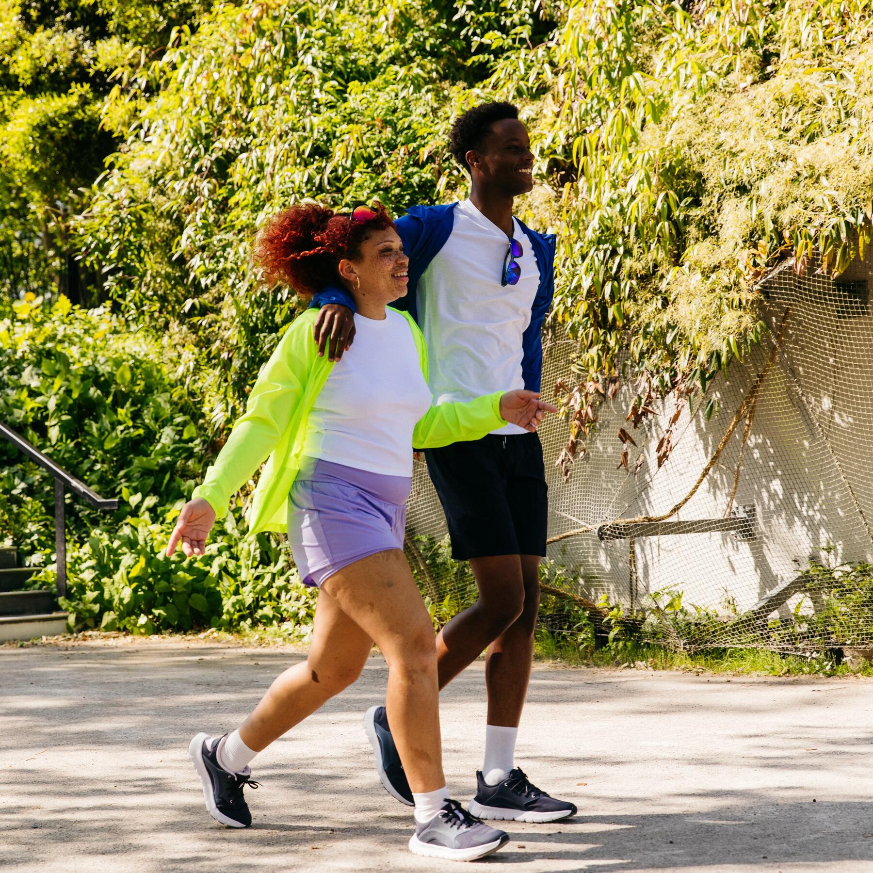 a young woman and man taking a walk together