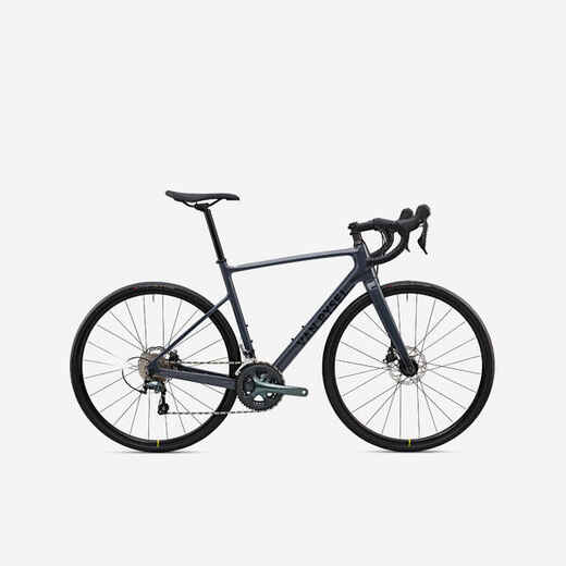 
      Pánsky cestný bicykel NCR CF Tiagra karbónový sivý
  