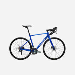 Bicicleta de carretera con cuadro de carbono azul NCR CF Tiagra