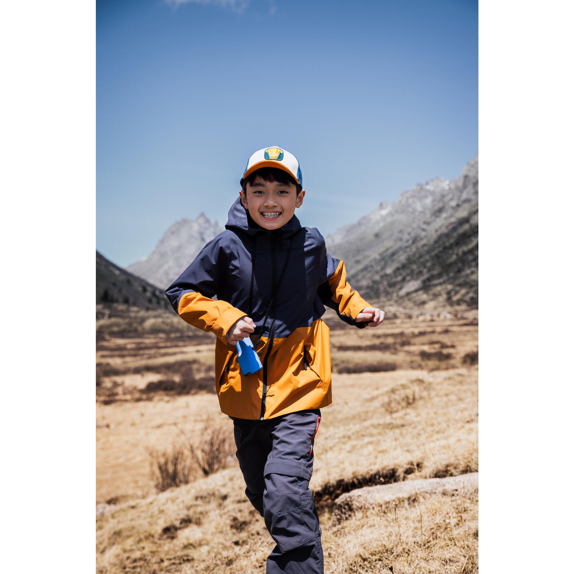 Giacca impermeabile da trekking - MH500 grigio e ocra - bambini 7-15 anni