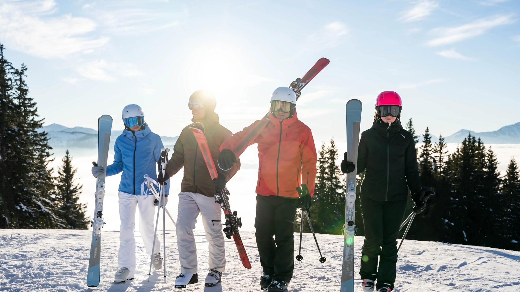A family on a chairlift going up to the summit