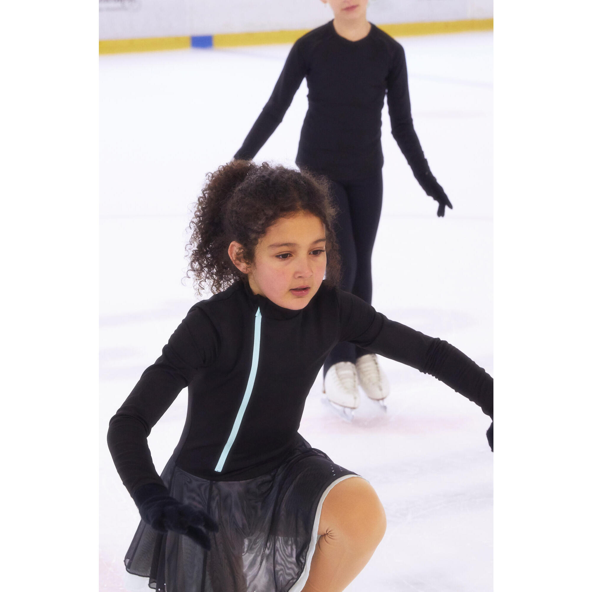 Black and mint figure skating training tunic.