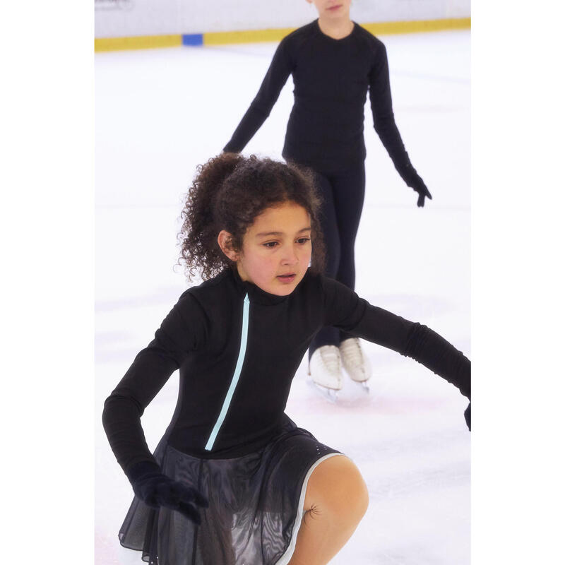 Tunique d'entrainement de patinage artistique noire et menthe.