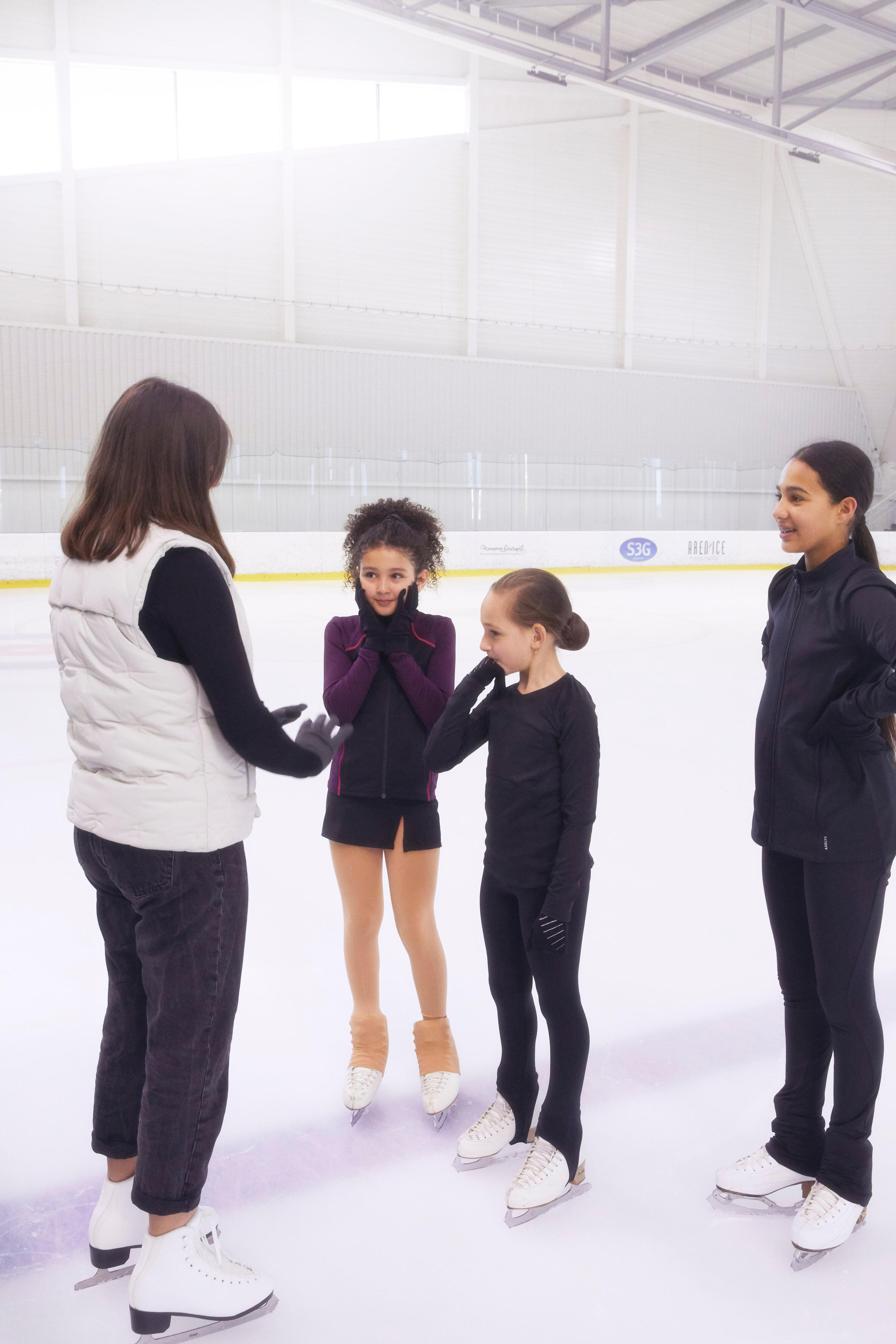 Röckchen Eiskunstlauf Junior schwarz 12/15
