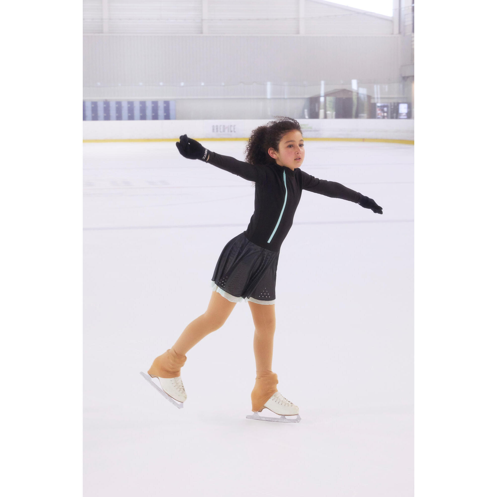 Black and mint figure skating training tunic.