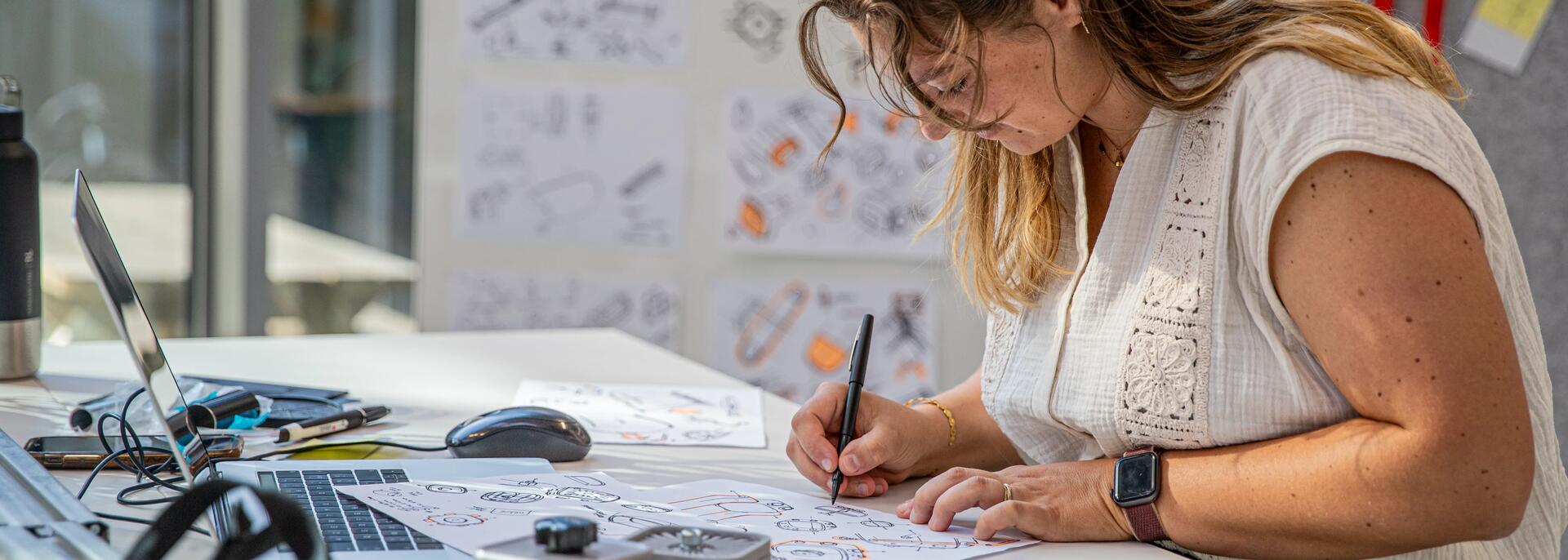 picture of a woman working on 