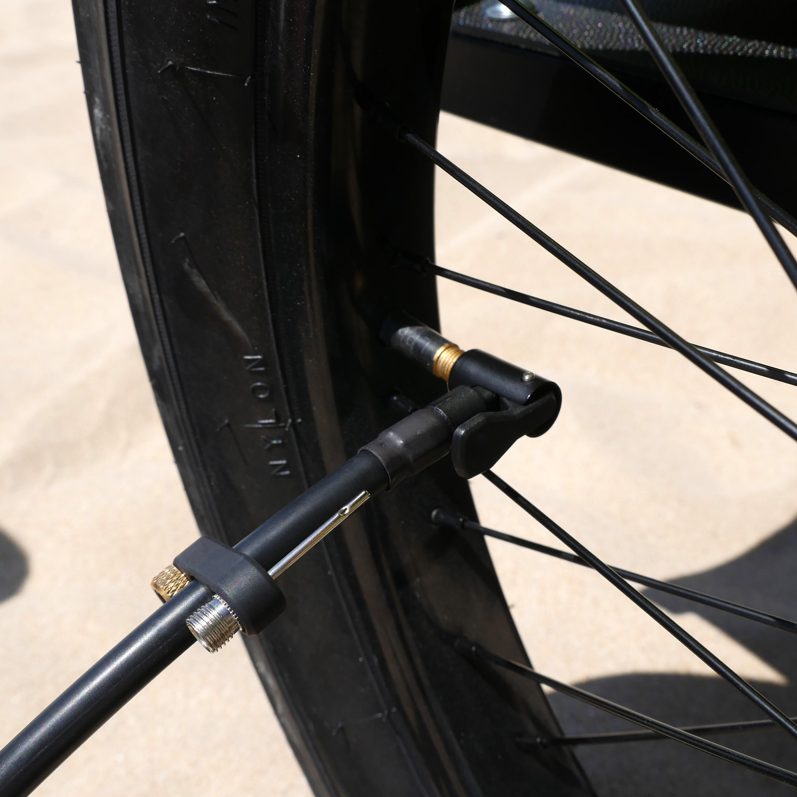 Portable electric bicycle pump