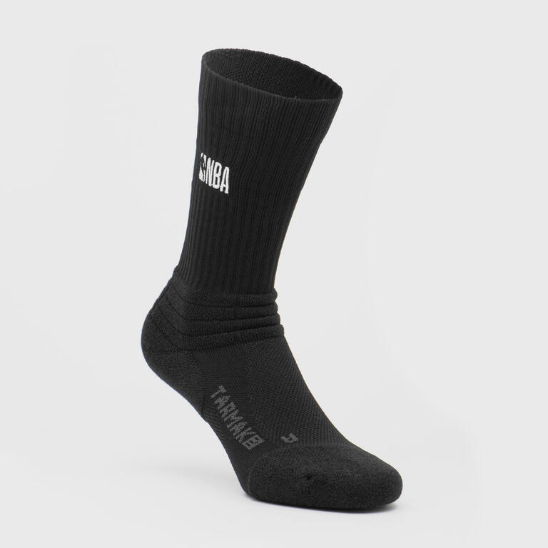 Black low-rise NBA basketball socks with cushioned foot sections and contrasting logo details