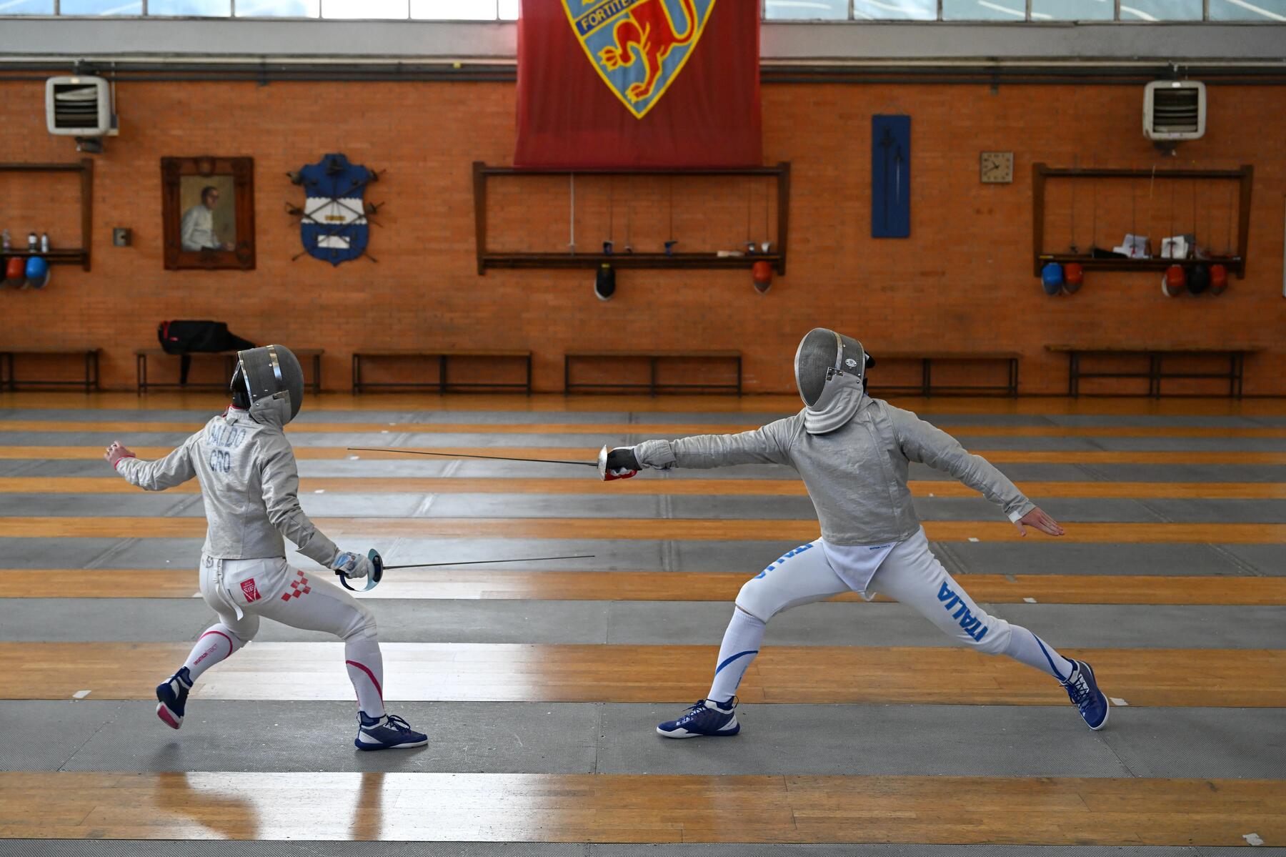 combate de esgrima