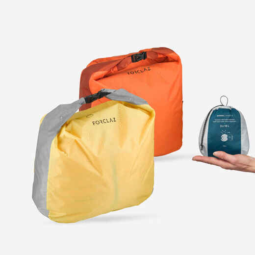 
      Kit de 2 fundas de 15L forma media luna para trekking Forclaz amarillo/naranja
  