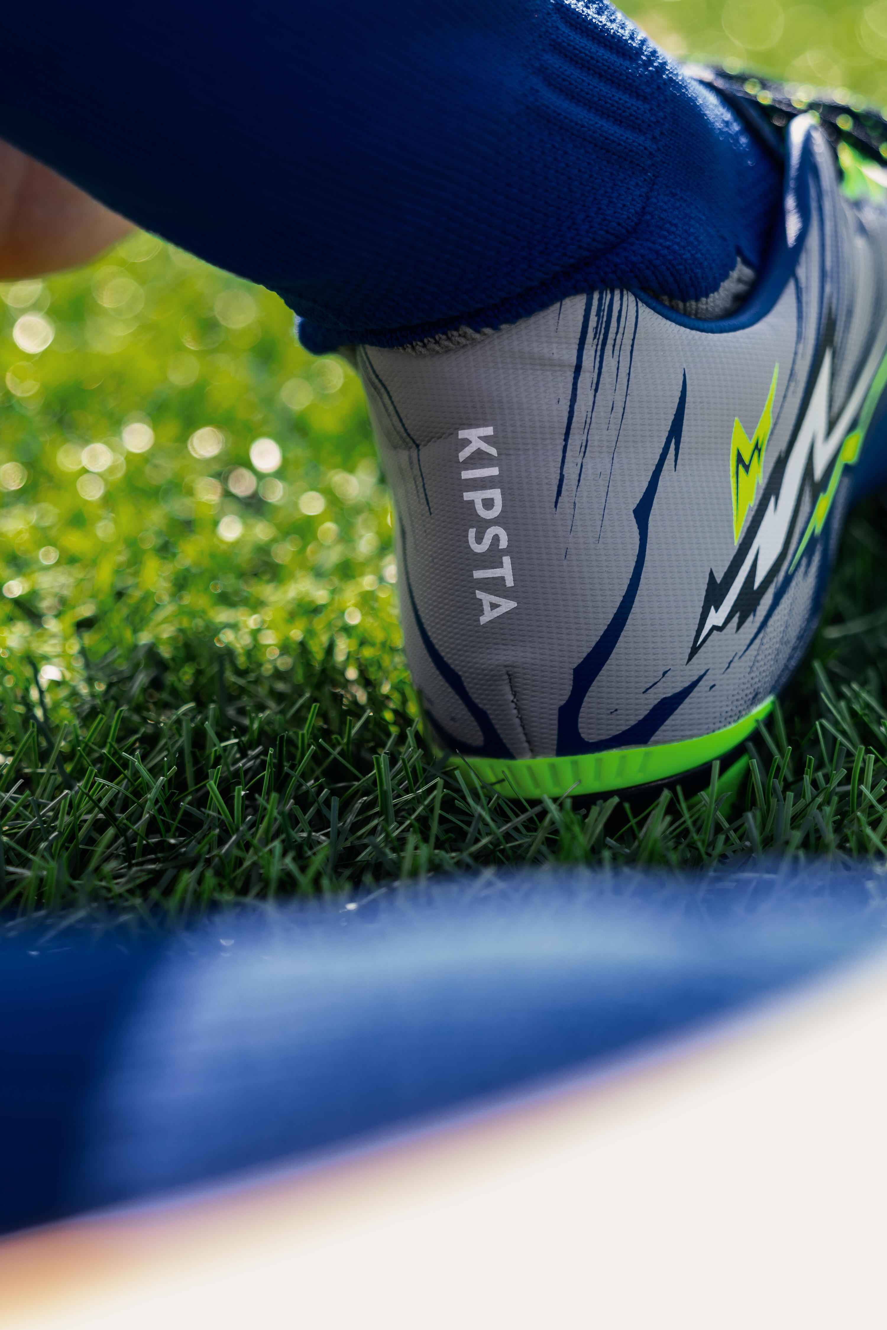 Scarpe rugby bambino R 500 FG blu 10/11
