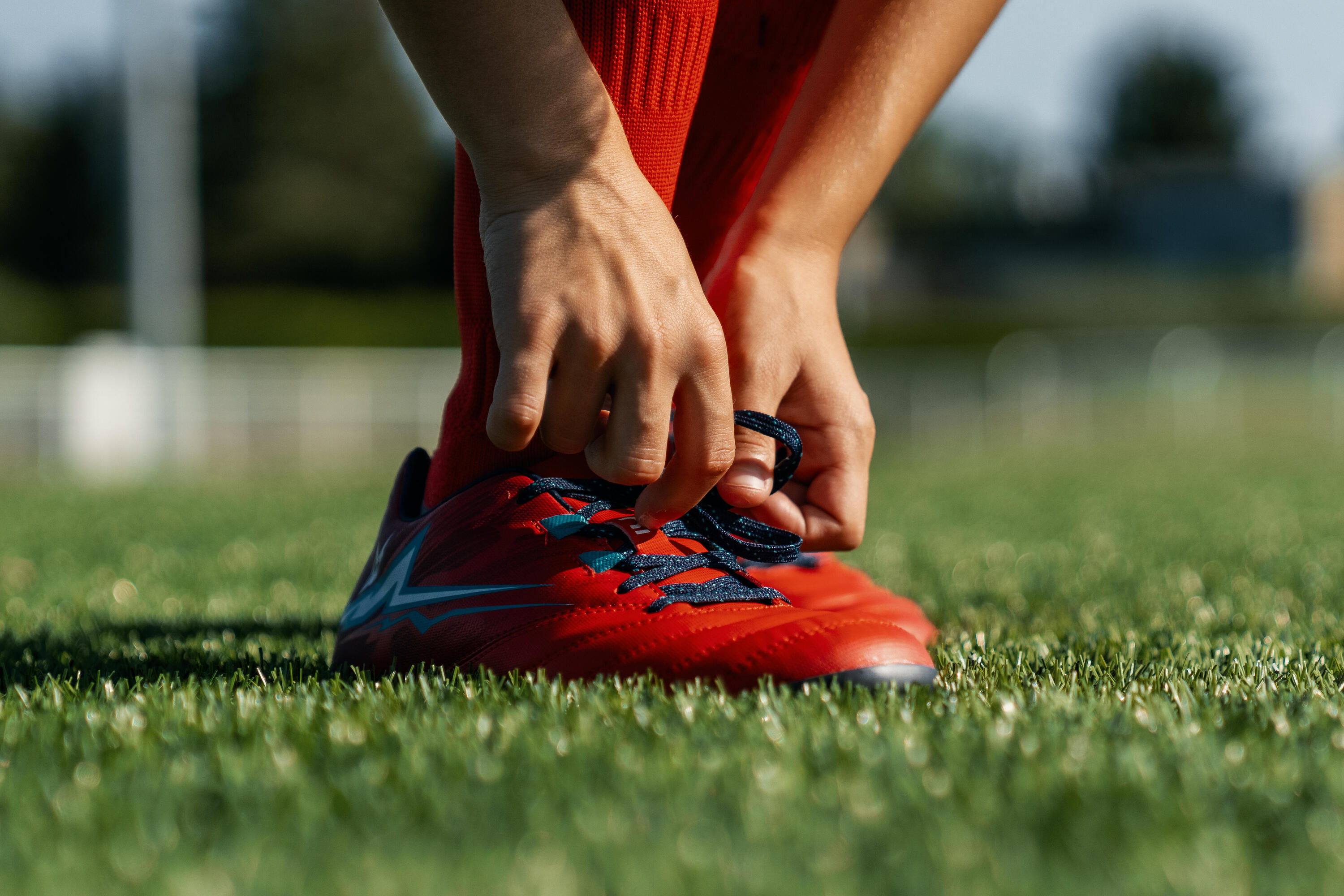Scarpe rugby junior R500 FG rosse 9/10