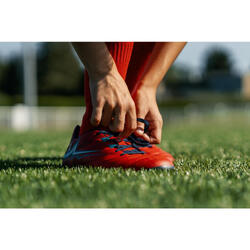 Botas de rugby con tacos fijos Easylace terrenos secos Niño - SKILL100 FG  azul rojo